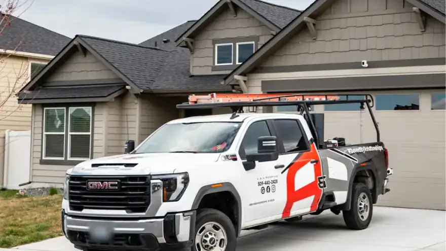The A&A pickup parked at a finished house